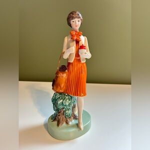 Tupperware Glazed Ceramic Woman Figurine in Orange and Cream